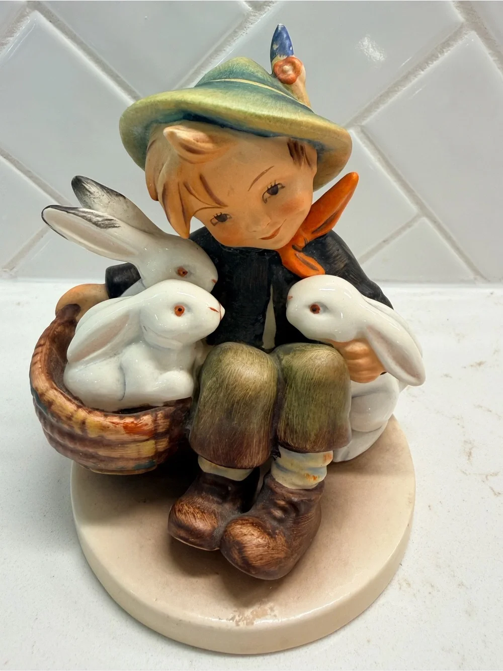 Hummel Style Boy with Bunnies Porcelain Figurine in Pastel Green and Brown